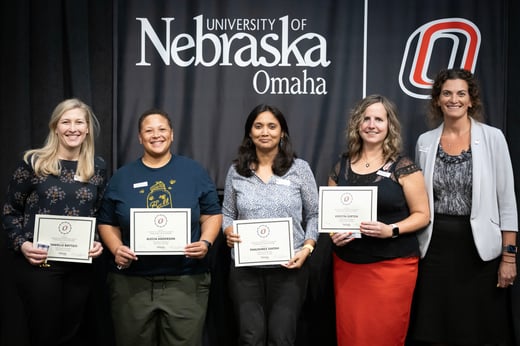 Dr. Battisti and her Co-PIs with their awards