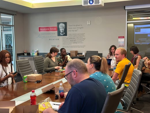 students eating lunch at a table