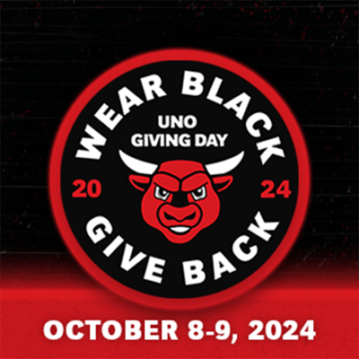 Logo for UNO Giving Day 2024, featuring a red and white bull head at the center with bold text around it that reads 'Wear Black, Give Back.' The year '2024' is displayed on either side of the bull head. Below the logo, the text 'October 8-9, 2024' is prominently displayed against a red and black background.