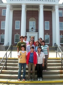ILUNO Group poses on the steps of Arts & Sciences Hall