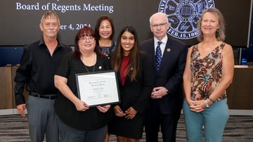 Pictured: Brian Thies, husband; Michelle Thies, recipient; Chancellor Li; Regent Ishani Adidam; President Gold and Dr. Heather Hundley, the Director of the UNO School of Communication.