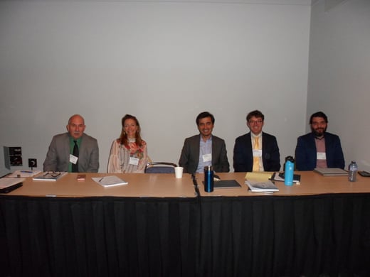 panelists seated at table