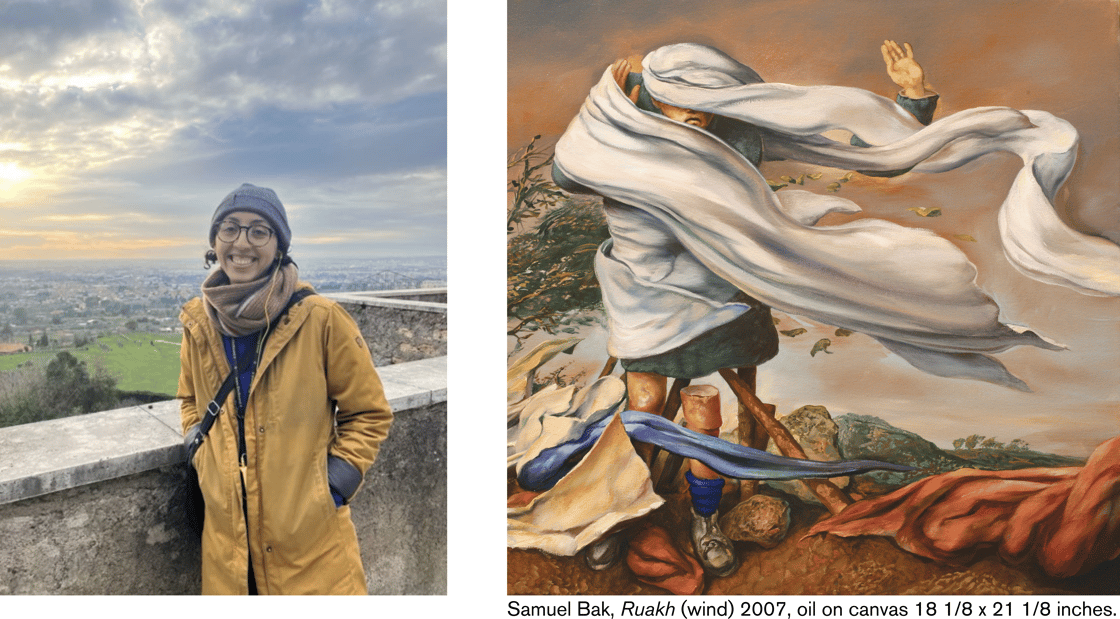  rectangle graphic to highlight a SBMLC student worker and their favorite Samuel Bak artwork. The right side of the graphic shows Toni Parker smiling at the camera, standing outdoors with a cityscape in the background. The person has curly dark hair partially covered by a gray beanie, and is wearing glasses. They are wearing a long, mustard-yellow coat, a blue shirt, and a multicolored scarf in shades of brown, beige, and red. A black crossbody bag strap is visible over their shoulder, and yellow earbuds hang around their neck. The person is standing on a stone ledge or wall, and behind them is a sprawling city under a cloudy sky with the sun setting or rising on the horizon, casting a warm glow. Green fields and trees are visible within the cityscape. The overall mood is cheerful and scenic. The left side of the graphic features a painting by Samuel Bak titled Ruakh (wind) created in 2007, using oil on canvas and measuring 18 1/8 x 21 1/8 inches. The painting depicts a figure struggling against a strong wind. The figure, a young boy, is wrapped in a long, flowing white cloth that billows dramatically around them, obscuring much of their face and body. The boy wears a light blue shirt, a dark green trench coat, and blue socks with gray shoes. His right arm is raised, with his hand gesturing as if trying to hold onto the cloth or brace against the wind. The figure stands amidst scattered debris, including pieces of wood, rocks, and colorful fabrics (white, blue, and red). A gnarled tree with sparse green leaves is visible in the background to the left, and a hazy landscape with a muted orange and brown sky fills the rest of the scene. The overall impression is one of vulnerability and struggle against powerful forces.