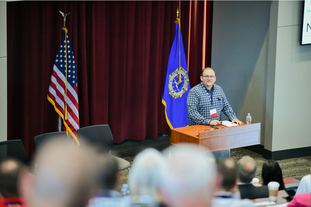 NCITE PI Michael Logan speaks to an audience at a recent symposium on threats to the agriculture sector. Photo courtesy FBI Omaha.