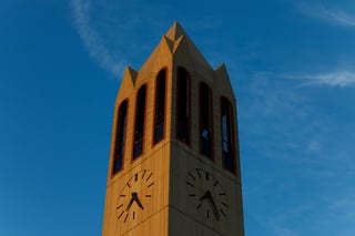 UComm -- MDBE -- Campanile sun blue skies