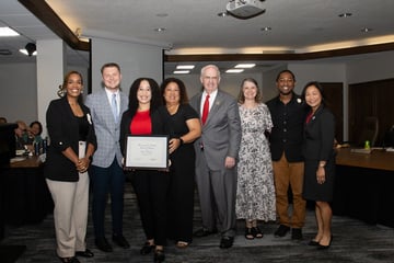 Sierra Roseby is presented with the KUDOS Award at the August 2025 Board of Regents meeting.