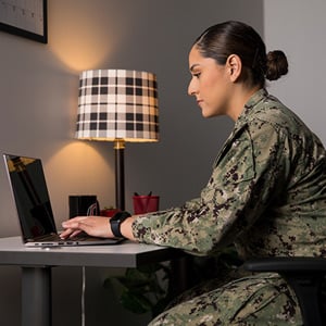 Military Student on Laptop MarComm