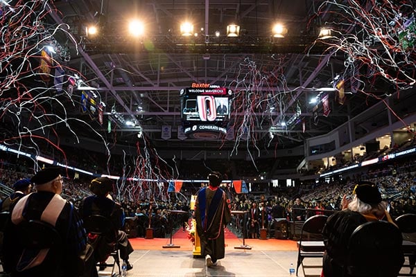 Streamers fill the air at the May 2023 Commencement.