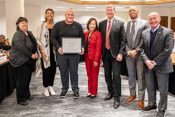 Michael Smith receives the Board of Regents KUDOS Award