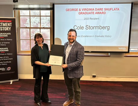 Cole Stormberg receives his award from Dr. Martina Saltamacchia