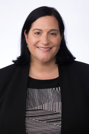 A professional profile picture of Hillary Nather-Detisch.